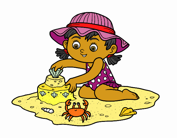 Una nena jugant a la platja