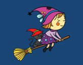 Bruixeta volant amb la seva escombra