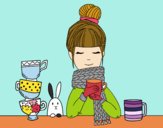 Noia amb bufanda i tassa de te